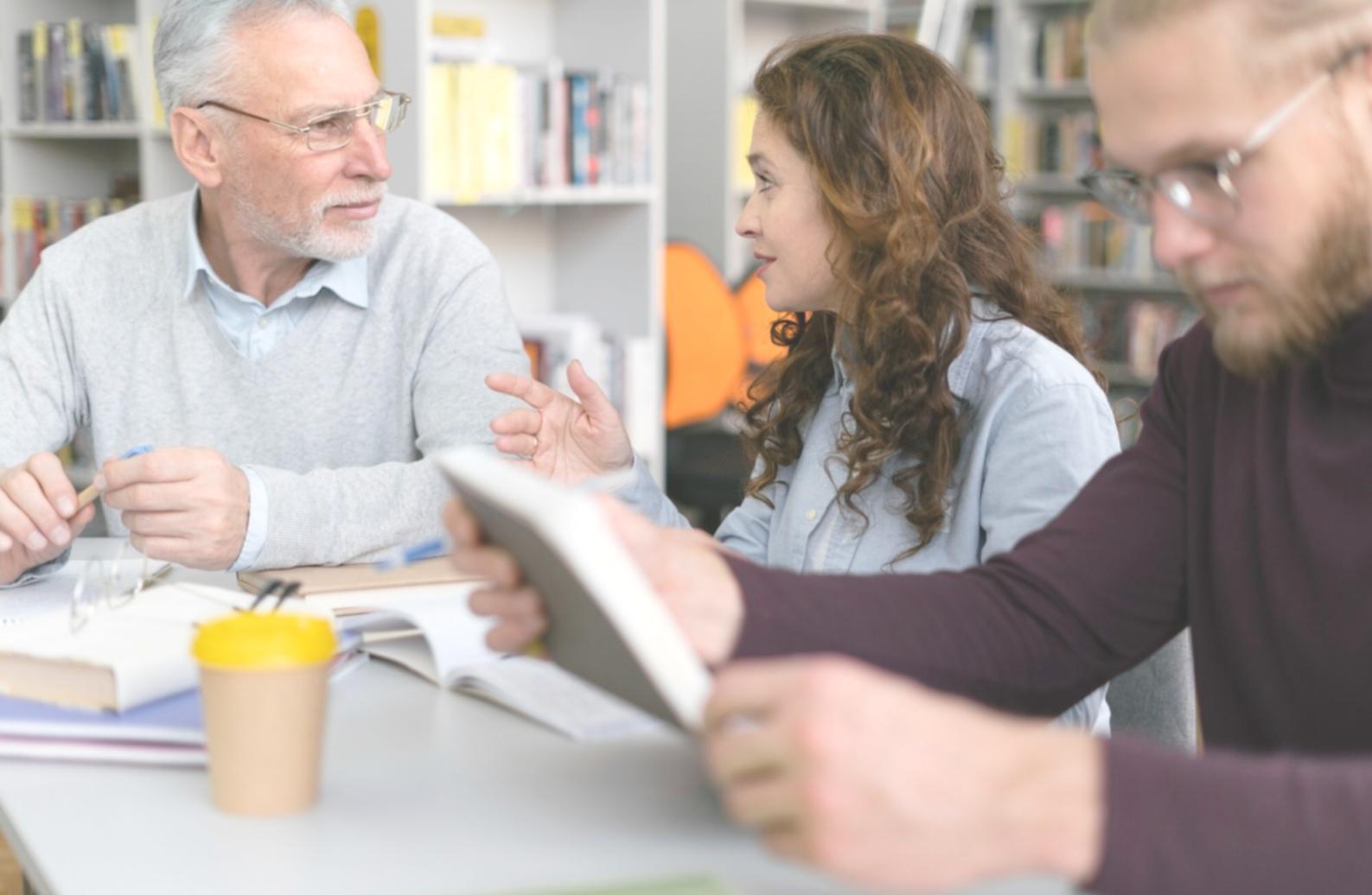 Risk assessment meeting with financial documents and analysis charts